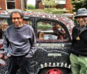 Photo of Albert Woodfox and Robert King with the Zulu Taxi, London 2016